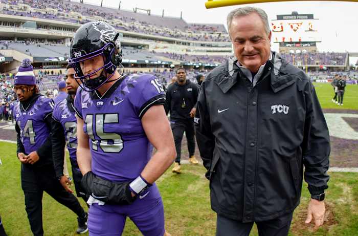 Max Duggan and Sonny Dykes walk off the field after a TCU win.